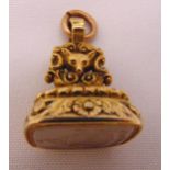 A Regency gold plated seal set with a carved white stone