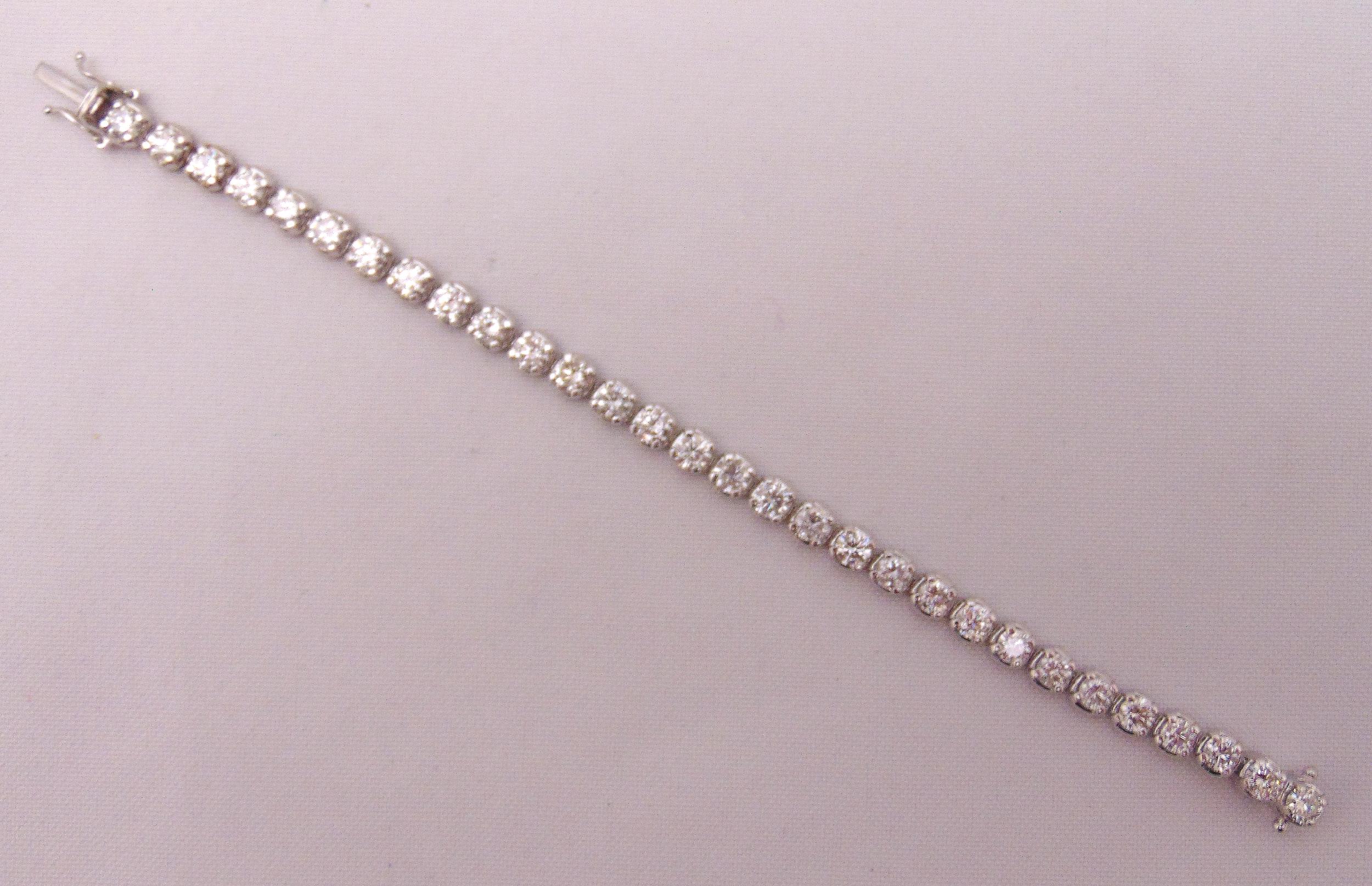 18ct white gold and diamond line bracelet, approx 9 carats of diamonds, approx total weight 20.2g