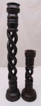 Two pierced barley twist oak candle holders on raised circular bases, tallest 90cm (h)