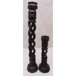 Two pierced barley twist oak candle holders on raised circular bases, tallest 90cm (h)