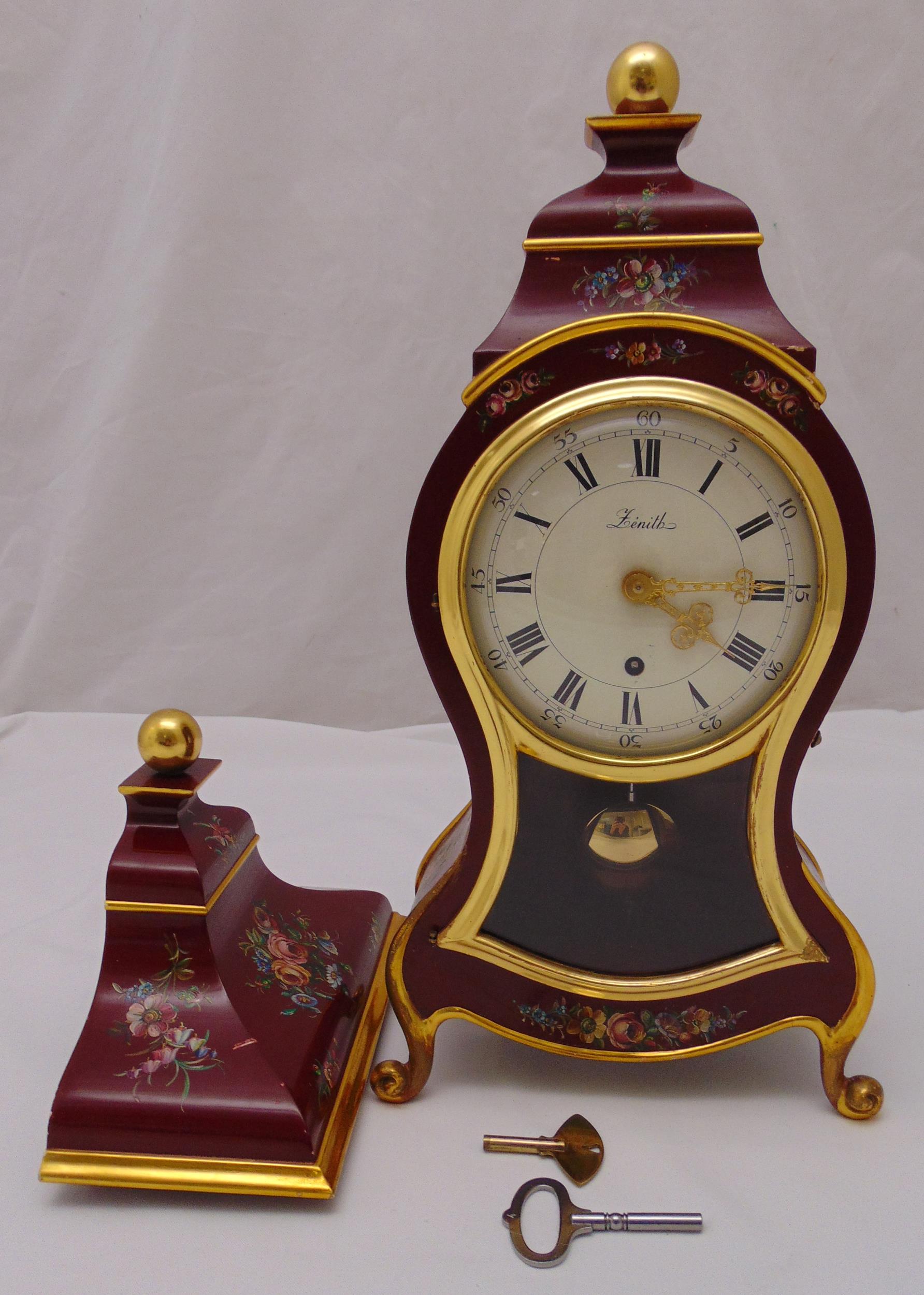 A 20th century Zenith mantle clock and wall bracket, white enamel dial with Roman numerals, single