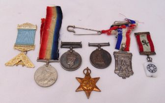 A quantity of medals and badges to include Masonic and WWII (7)