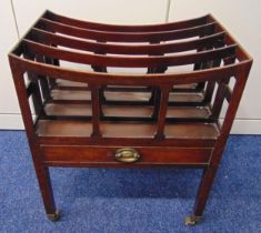 A George III rectangular mahogany Canterbury circa 1790 with single drawer on original brass castors