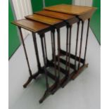 An Edwardian rectangular mahogany nest of four tables with faux bamboo supports, tallest 76 x 46 x