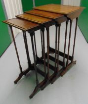 An Edwardian rectangular mahogany nest of four tables with faux bamboo supports, tallest 76 x 46 x