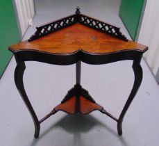 A late 19th century mahogany triangular corner table on three cabriole legs, 77 x 64 x 36cm