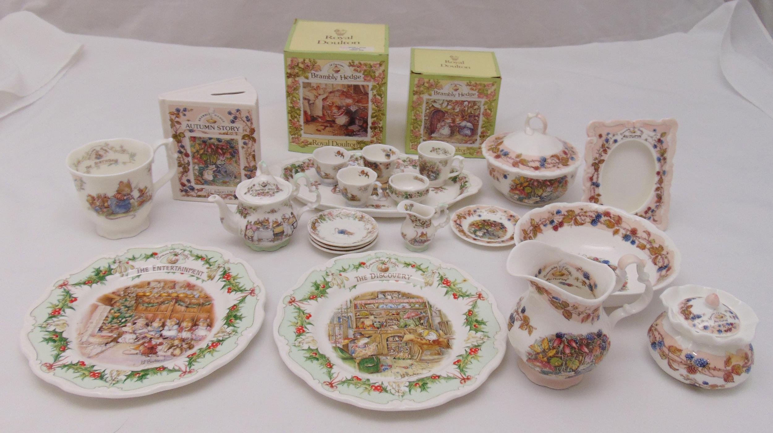 Royal Doulton Brambly Hedge porcelain to include a childs teaset, two plates, a cup, a money box a
