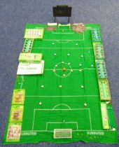 A quantity of Subbuteo table soccer to include teams, goals, a layout and accessories