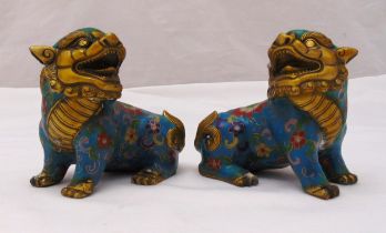 A pair of cloisonn‚ and gilded metal Temple dogs, 11.5 x 12 x 6.5cm each