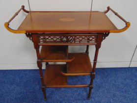 An oriental style shaped rectangular table with two side handles on four turned supports, A/F, 72.
