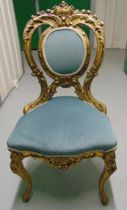 A late 19th French style century gilded wooden boudoir chair with upholstered seat and back on