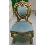 A late 19th French style century gilded wooden boudoir chair with upholstered seat and back on