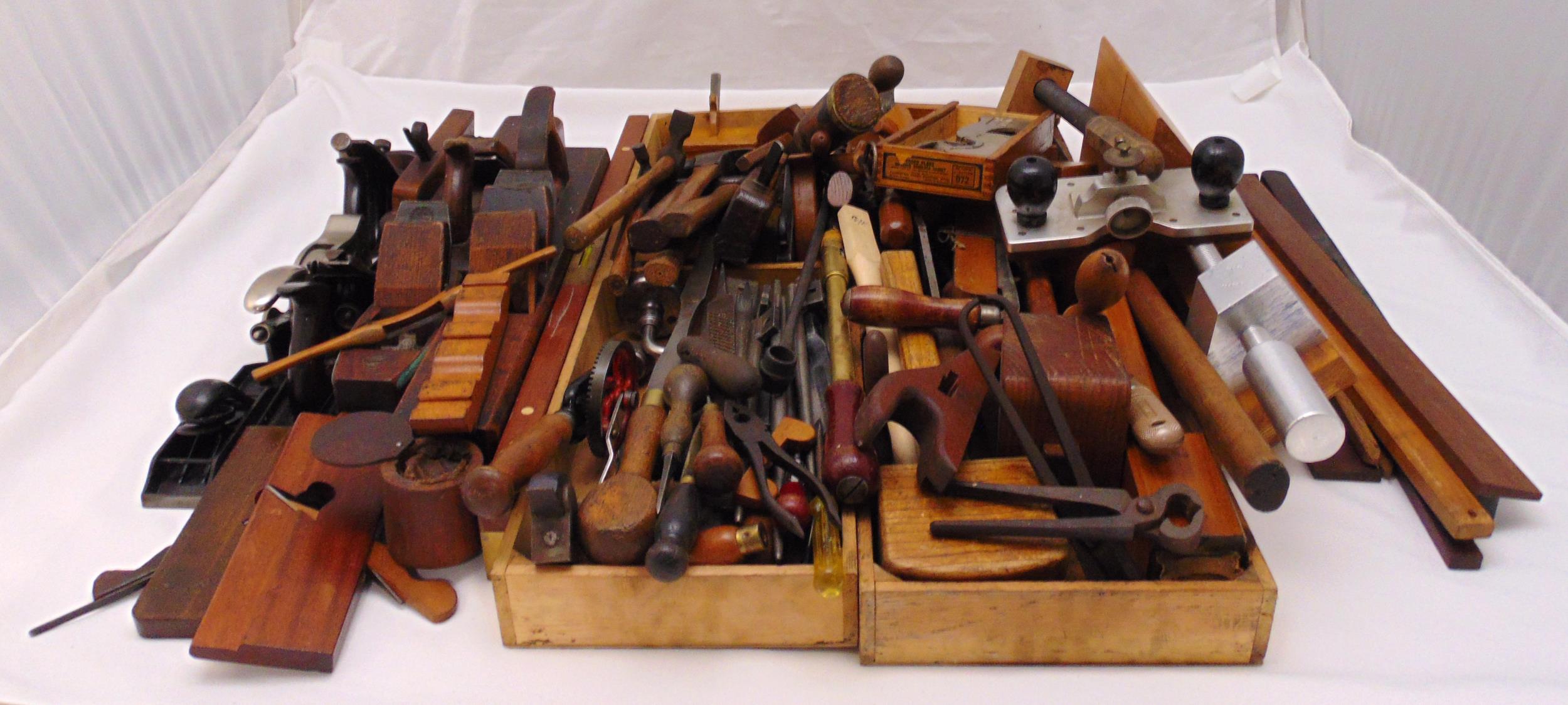 A quantity of vintage wood working tools to include mallets, hammers, planes, saws, gauges and