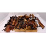 A quantity of vintage wood working tools to include mallets, hammers, planes, saws, gauges and