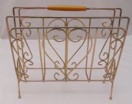 A gilt metal rectangular double sided magazine rack with turned wooden carrying handle, 37 x 39 x