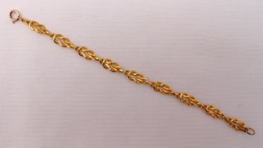 A gold fancy link bracelet, tested 18ct, approx total weight 13.4g