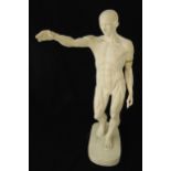 A plaster model of a classical nude displaying his musculature on raised oval plinth, 74cm (h)