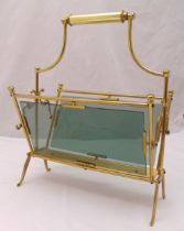 A gilt metal and glass double sided rectangular magazine rack with carrying handle, 59 x 43 x 28cm
