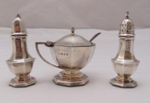 A hallmarked silver three piece condiment set, approx total weight of silver 130g