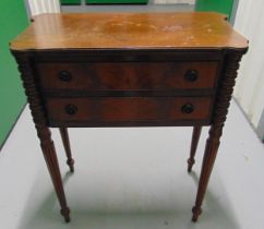 An early 20th century rectangular mahogany hall desk with two drawers on four tapering circular