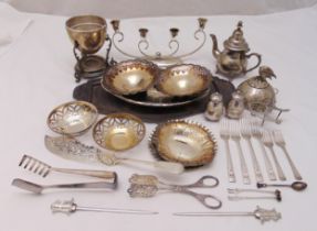 A quantity of silver plate to include teapot, bonbon dishes, condiments and flatware