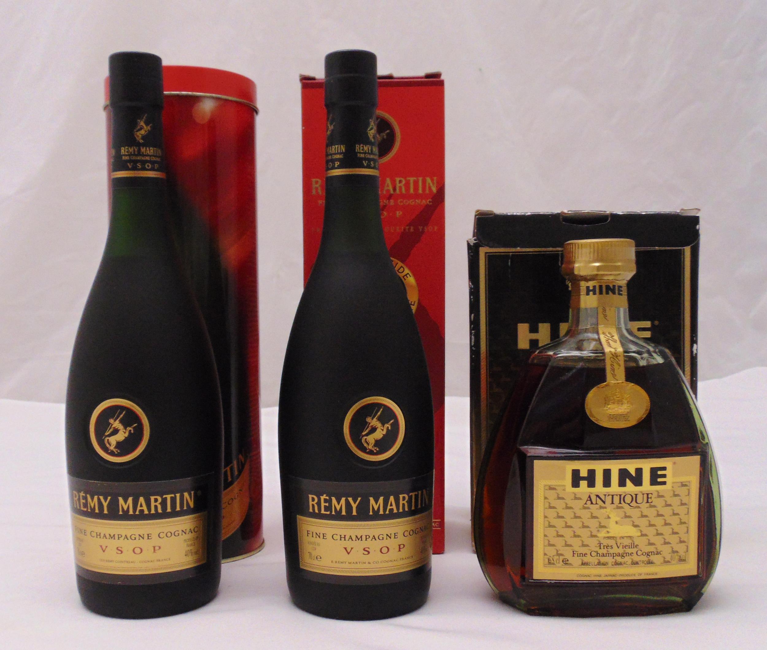 Three bottles of Cognac to include Hine Antique and two bottles of Remy Martin