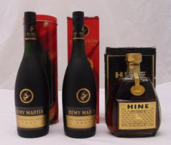 Three bottles of Cognac to include Hine Antique and two bottles of Remy Martin