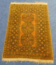 A Kayan wool Persian carpet, brown ground with repeating geometric pattern, 150 x 98cm