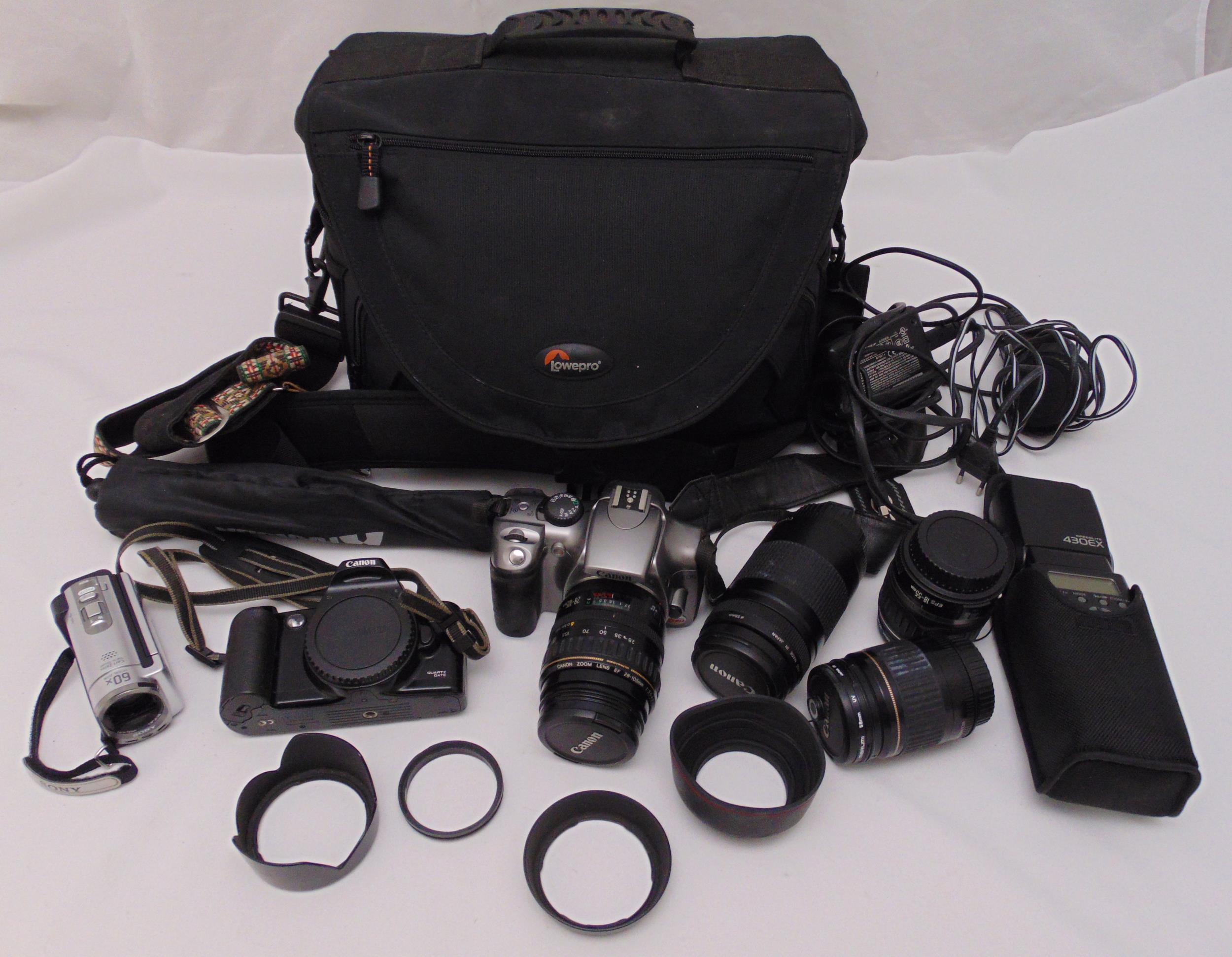 A Canon EOS camera to include carrying case, lenses and accessories
