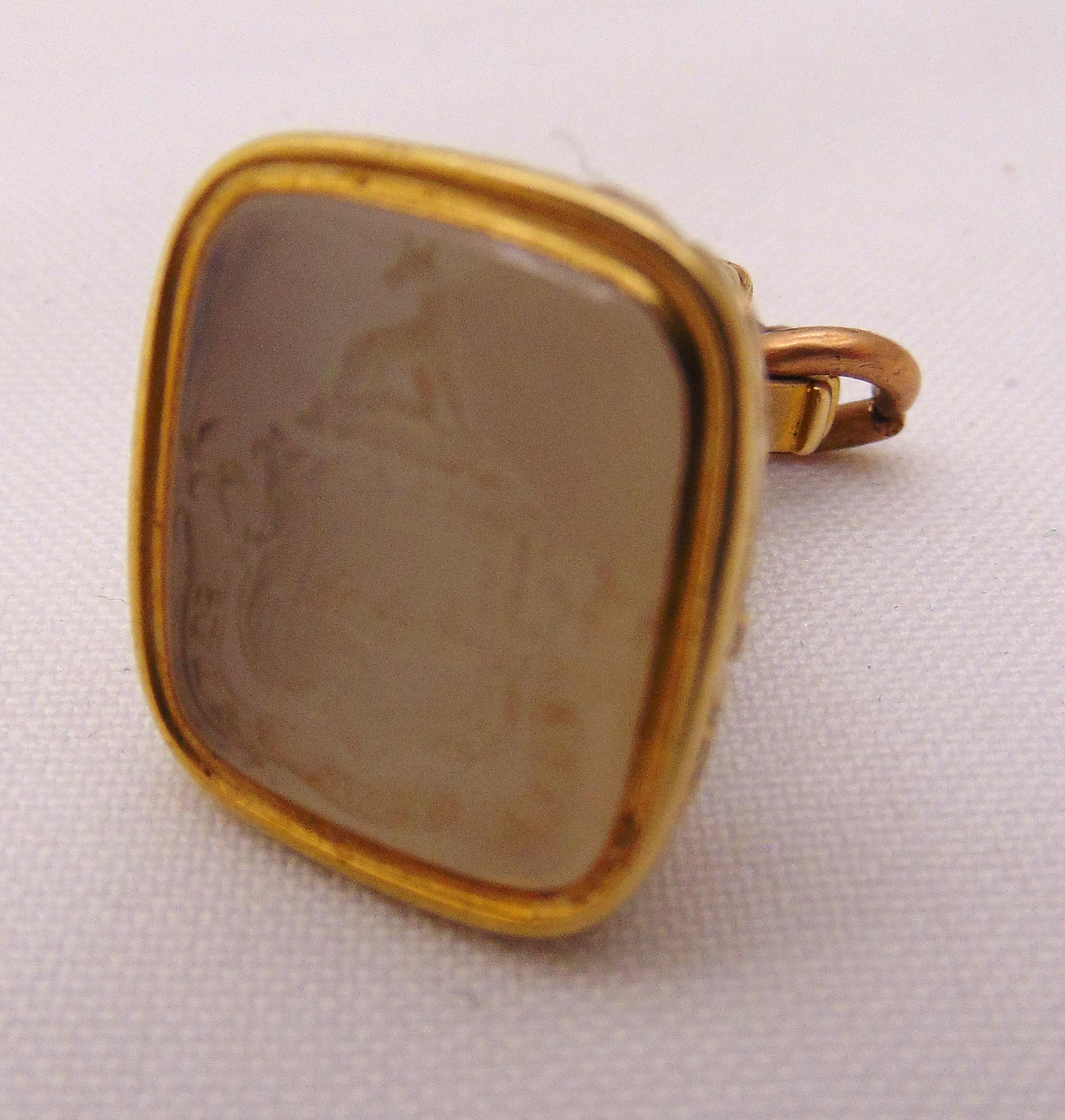A Regency gold plated seal set with a carved white stone - Image 2 of 2