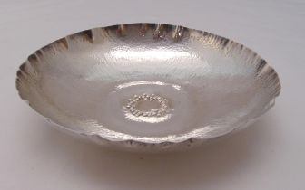 A hallmarked silver hand hammered circular dish approx 240g, London 1970