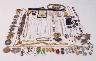 A quantity of costume jewellery to include necklaces, bracelets, brooches, earrings, cufflinks and