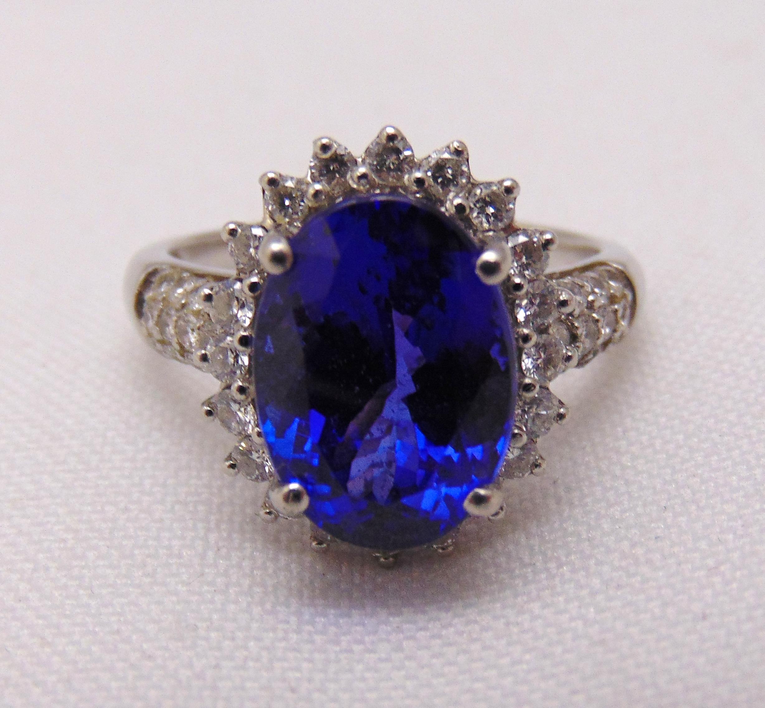 Tanzanite and diamond ring set in white metal tested platinum, tanzanite approx 7.7ct, approx