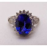 Tanzanite and diamond ring set in white metal tested platinum, tanzanite approx 7.7ct, approx