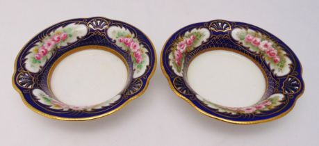 Two Staffordshire porcelain fruit dishes decorated with flowers, leaves and gilded border, 22cm (w)