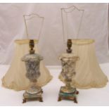 A pair of marble table lamps on marble rectangular plinths with gilt metal claw feet, to include