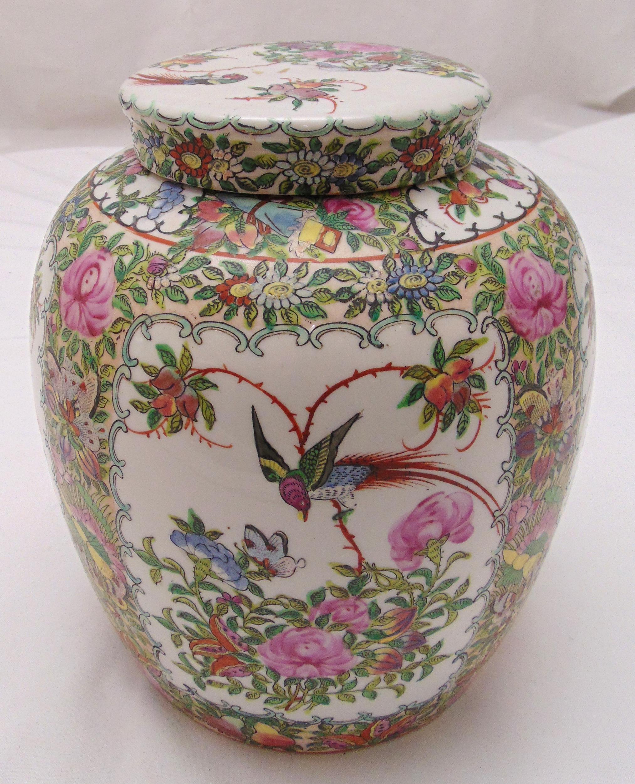 A Chinese ginger jar and cover, decorated with birds and foliage, 26cm (h)