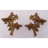 A pair of gilded wooden two tier wall mounted shelves in the form of a branch with leaves, 28.5 x 24