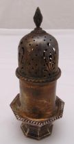 A hallmarked silver sugar sifter, cylindrical and panelled form with pierced pull off cover,