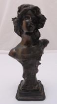 An Art Nouveau style bronze bust of a lady on rectangular stepped base, 34 cm (h)