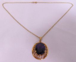 9ct gold and garnet pendant on a 9ct gold chain, approx total weight 10.6g