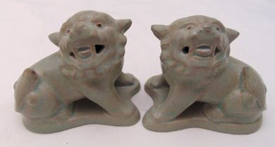 A pair of Chinese ceramic celadon lion figurines, 9.5 x 10.5cm