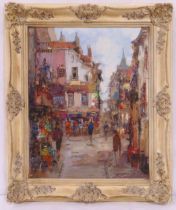 A framed oil on canvas of a Parisienne street scene, indistinctly signed bottom right, 51.5 x 41.