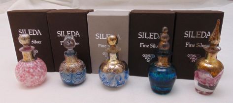 Five Sileda hand blown dressing table perfume bottles of various form, size and colour with