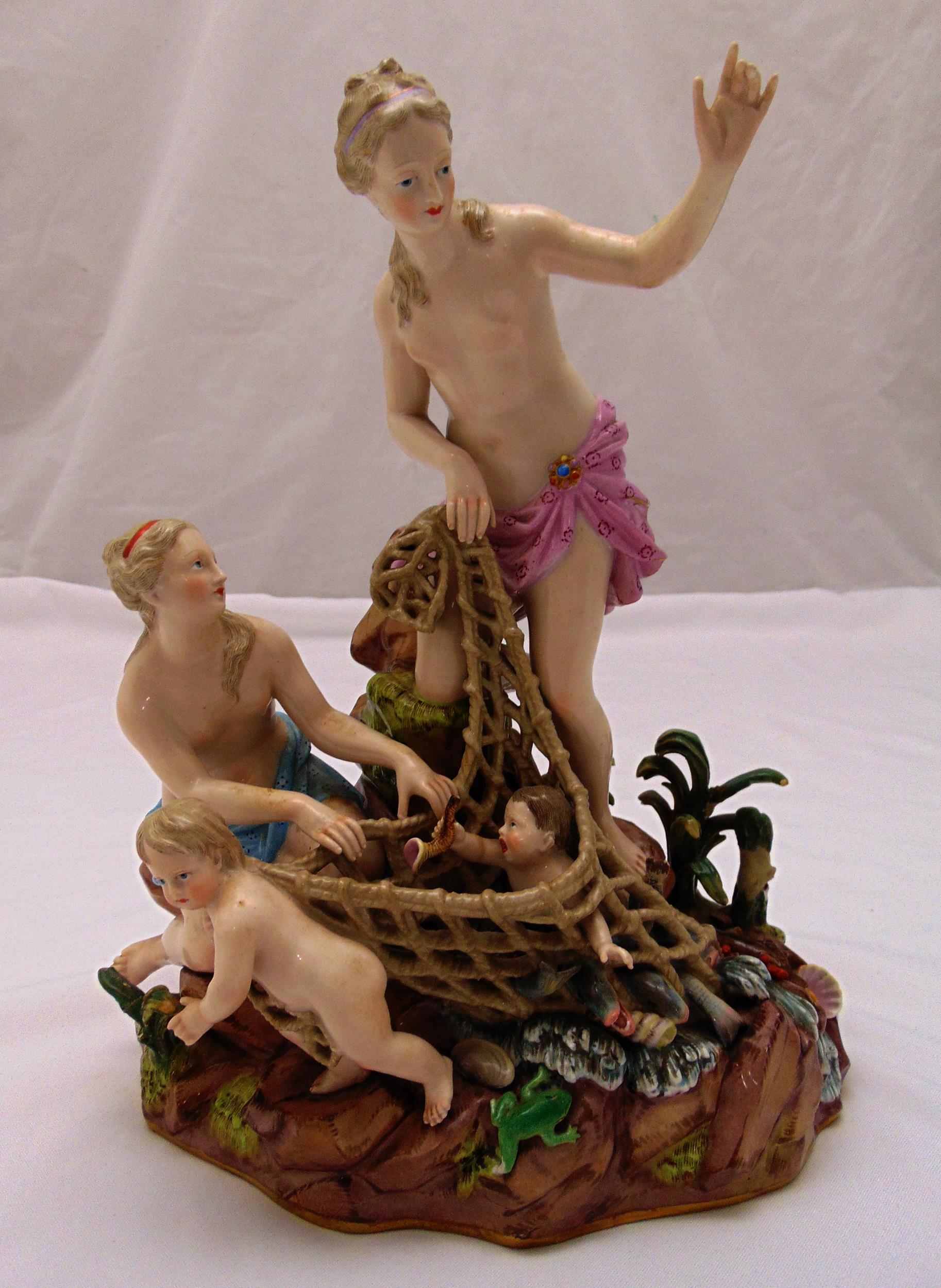 Meissen figural group the Capture of the Tritons, depicting Venus assisted by Cupid on a rockwork