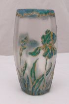 An early 20th century continental glass vase of oval form decorated with applied flowers, leaves and