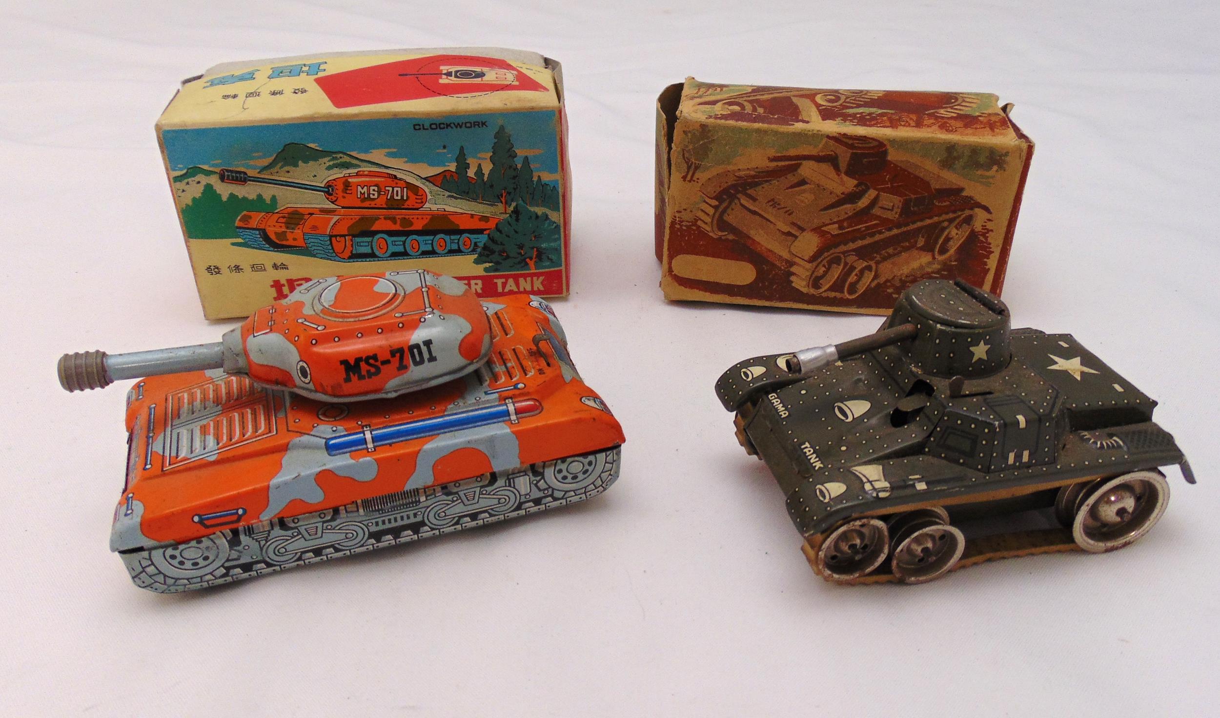 Two vintage litho tin plate tanks to include Gama Tank and a Super Tank, both in original packaging