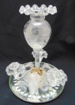 A glass epergne with central ovoid vase on ribbed stem with detachable leaves and flowers all on