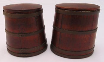 A pair of wooden oval brass bound barrel shaped tea caddies with pull off covers, 13cm (h)