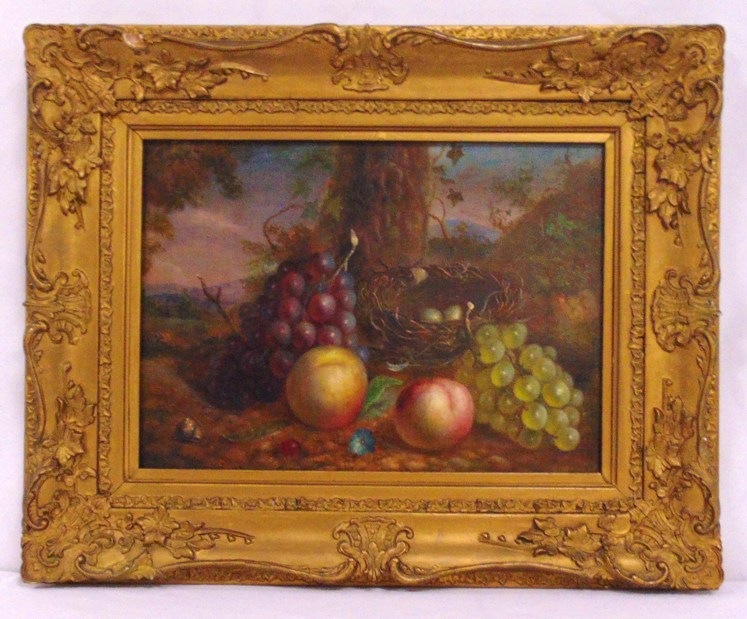 A framed oil on canvas still life with fruit and a birds nest with eggs under a tree, 29 x 40cm